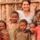 Julia Lalla-Maharajh with girls in Ethiopia.
